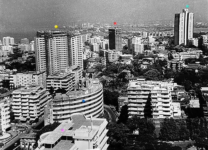 Historic view of 1970s Bombay skyline from Cumballa Hill featuring Usha Kiran, Jaslok Hospital under construction, and Sterling Apartments.